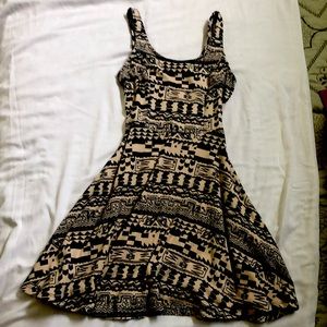 Shapes off yellow and black dress